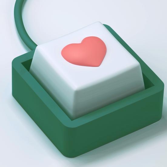 En tastaturlignende hjerteknap med ledning.