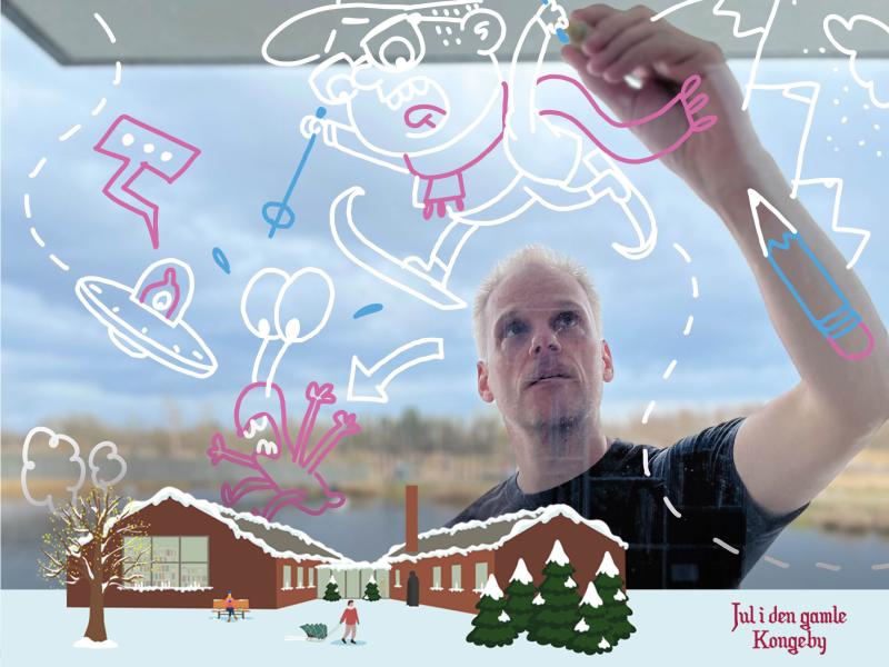 Peter Hermann står og tegner sjove illustrationer.