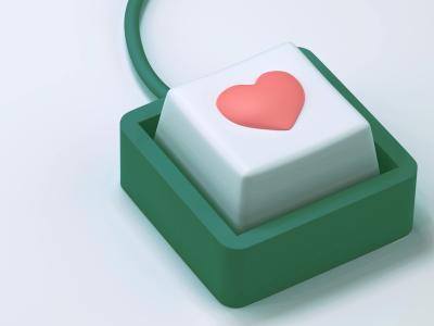 En tastaturlignende hjerteknap med ledning.